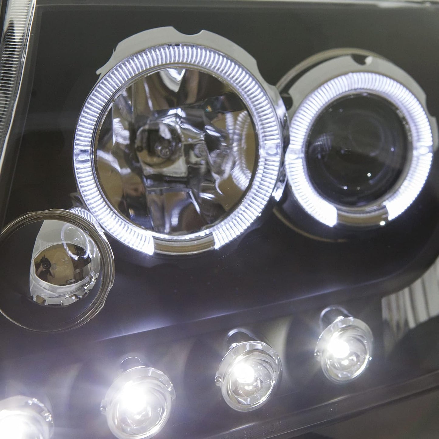 Faros Delanteros Aftermarket. Mitsubishi Montero 2001-2006